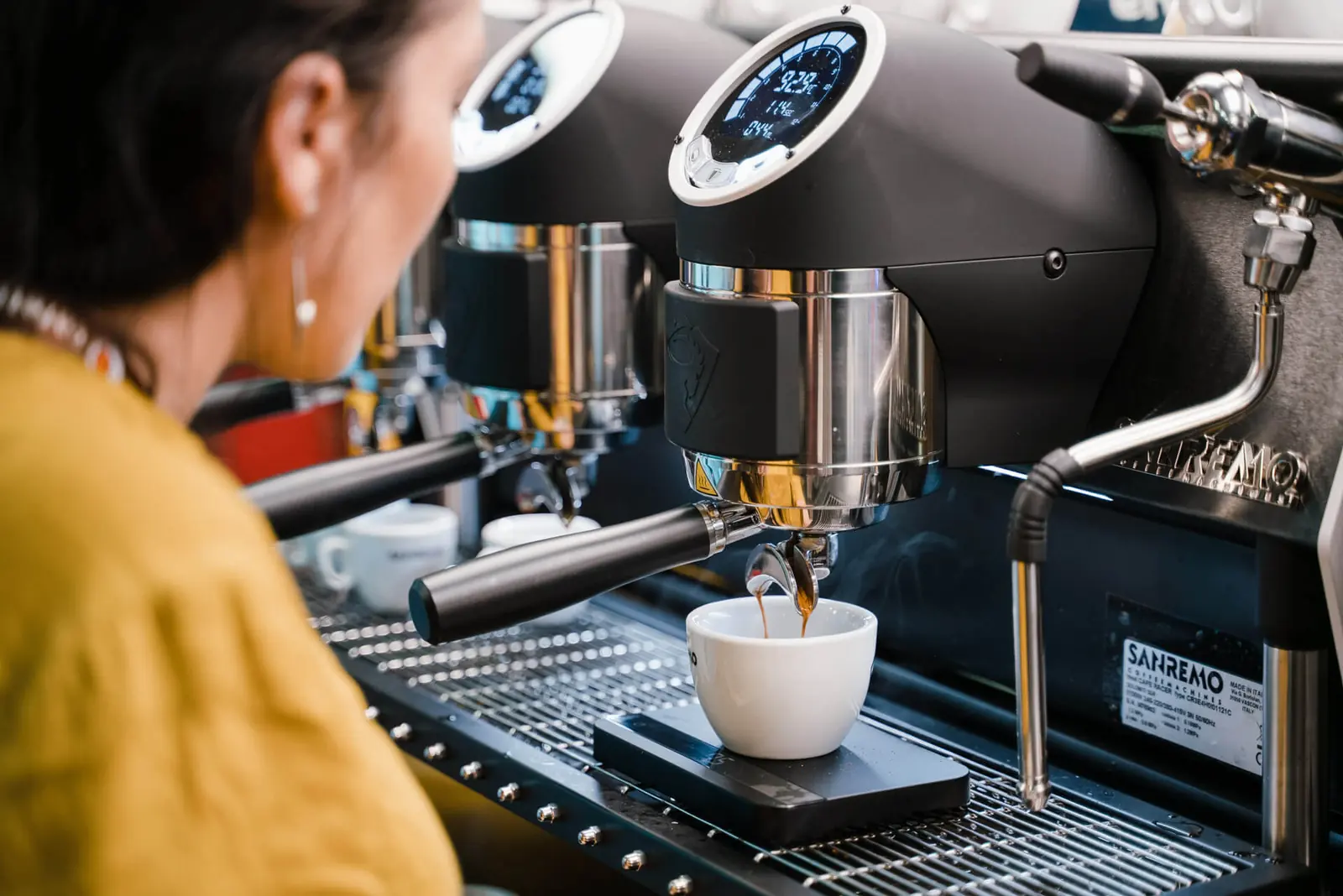 Barista preparing espresso on a Sanremo Café Racer